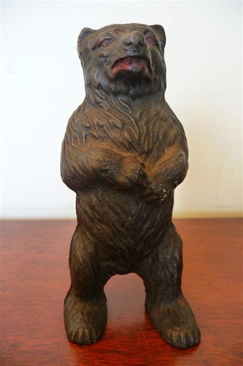 cast metal bear money box|antique black man money box.